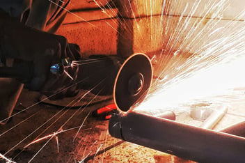 Angle grinder in industrial environment