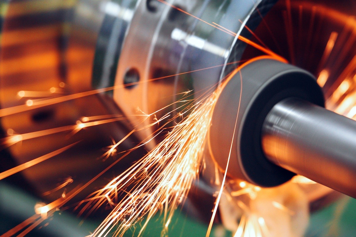 Machine grinding for metal finishing